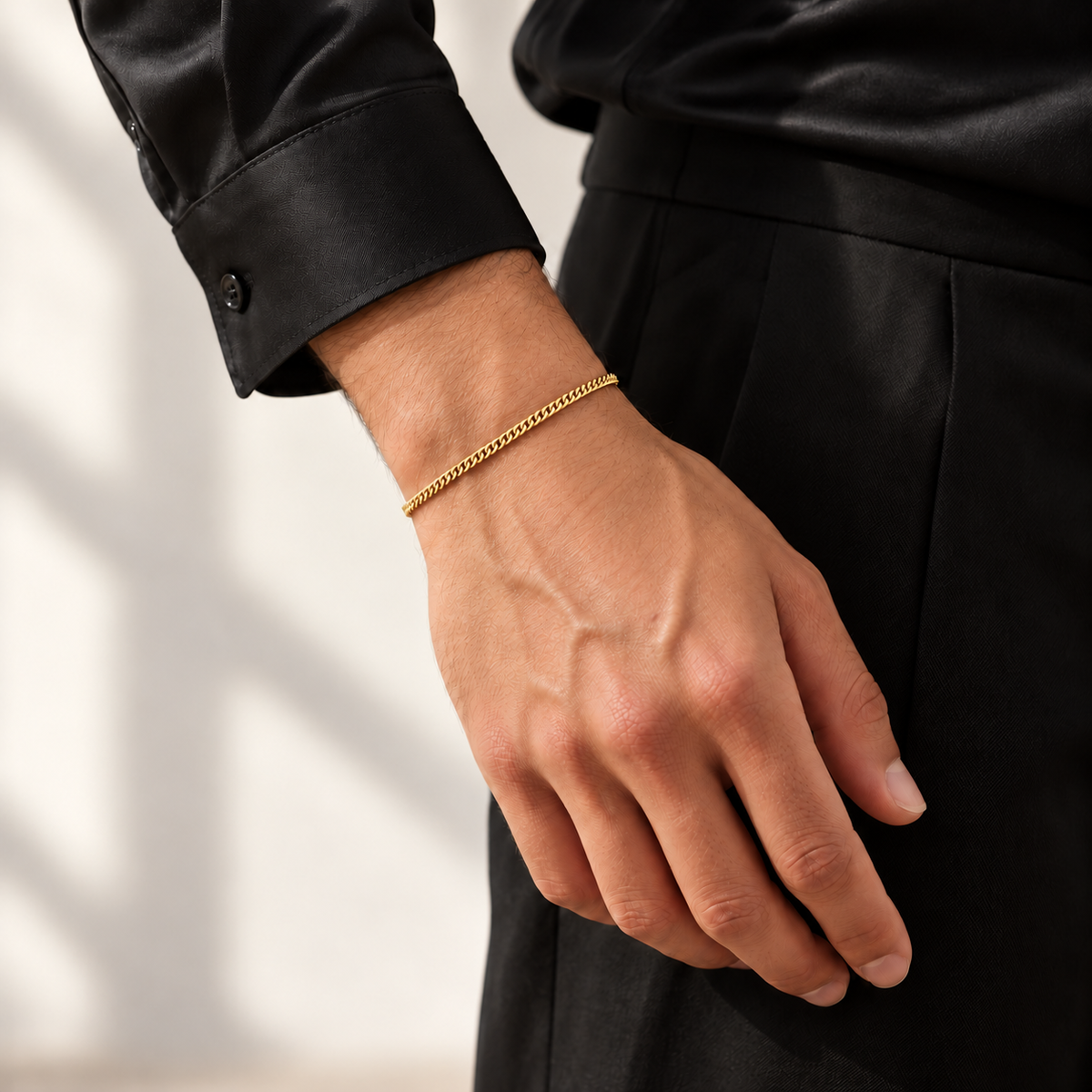 Gold 2mm Cuban bracelet, standing model view