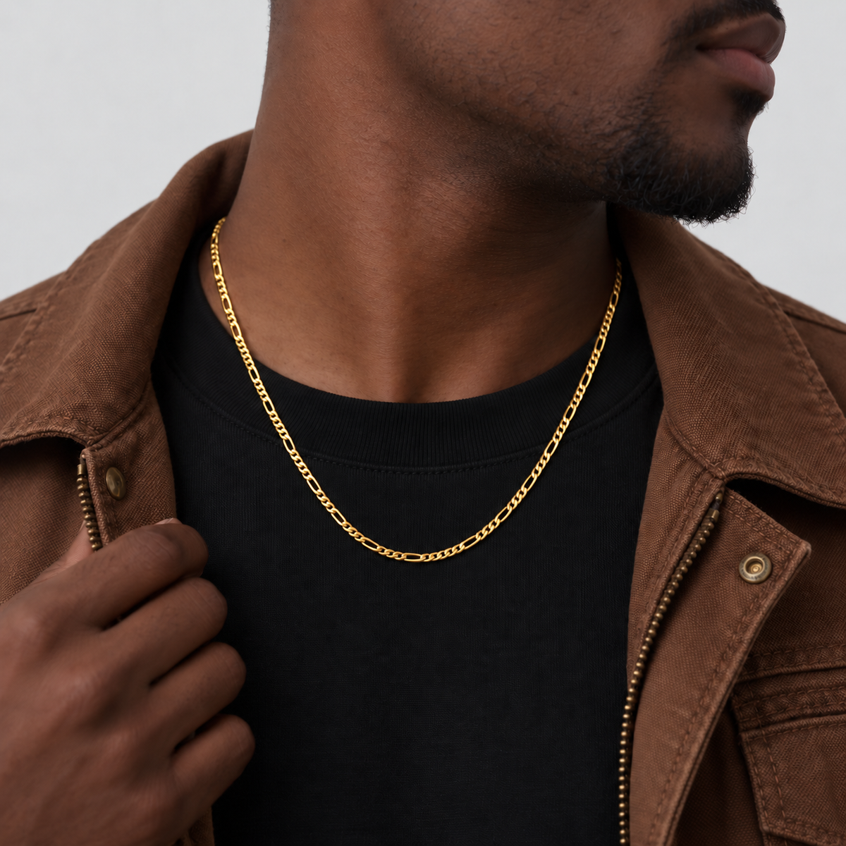 Unveiled 3mm Figaro chain, 18k PVD gold, Looking away · 50cm