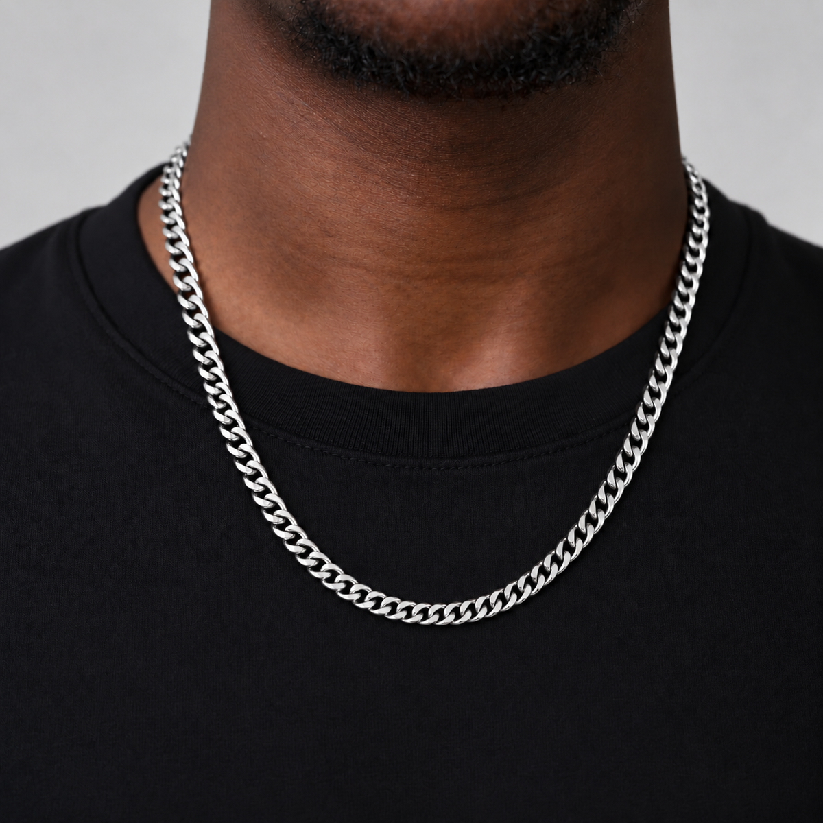 6mm silver Cuban chain, 55cm, black tee model photograph