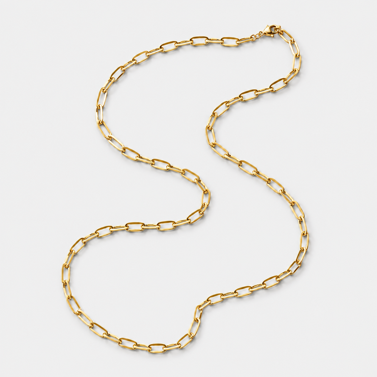 Paperclip Chain gold full necklace on light grey background
