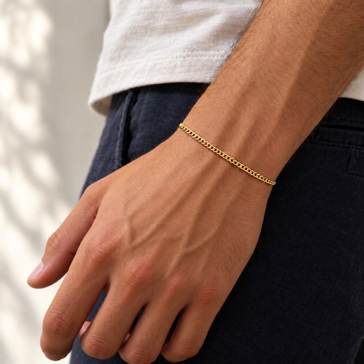 Gold 2mm Cuban bracelet, relaxed model view
