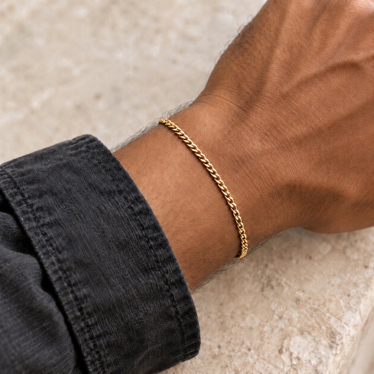Gold 2mm Cuban bracelet, charcoal model view