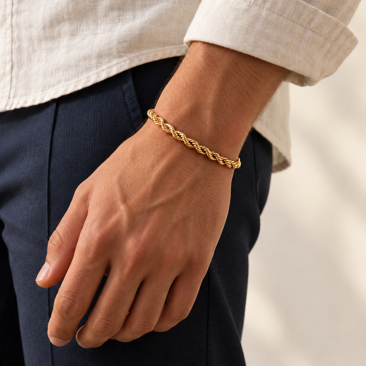 Gold 5mm rope bracelet, relaxed model photo